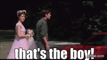 a bride and groom are walking in front of a red car with the caption that 's the boy ..