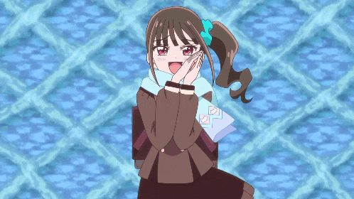 a girl with a scarf around her neck is laughing with her mouth open