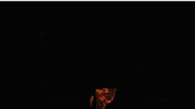 a large ball of fire against a dark background
