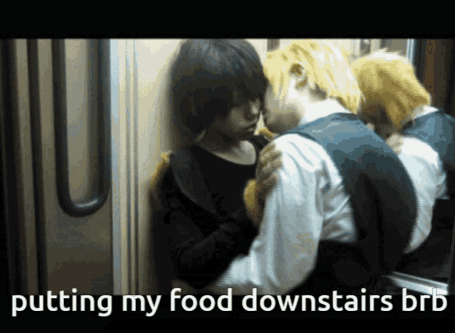 a couple kissing with the caption putting my food downstairs