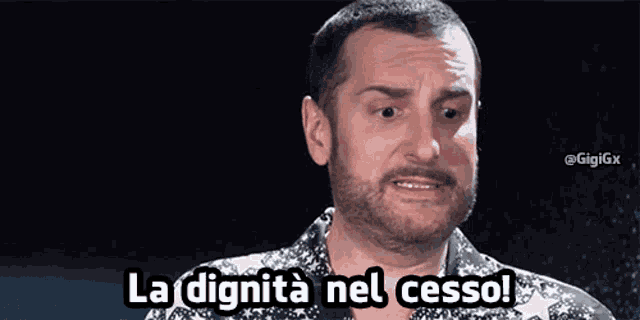 a man with a beard is saying la dignita nel ccesso