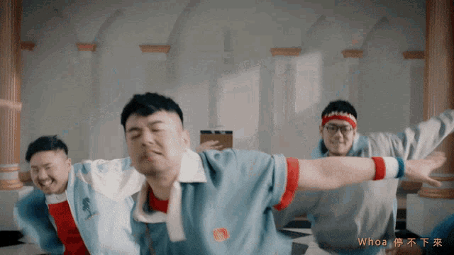 a man wearing a headband that says ' whoa ' on it is doing a yoga pose