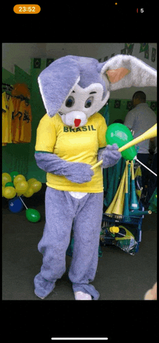 a bunny mascot wearing a yellow brasil shirt