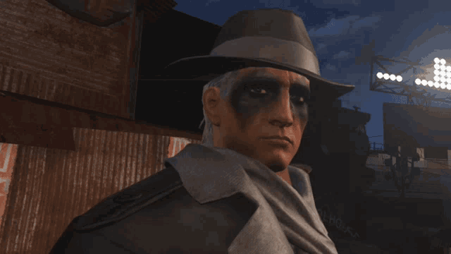 a man with black paint on his face is wearing a fedora hat