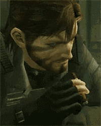 a man with a beard is holding a piece of meat in his hand