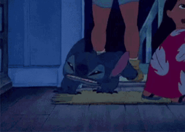 stitch from disney 's lilo and stitch is standing on a wooden floor eating pizza .