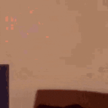 a close up of a person 's face with their eyes wide open