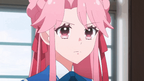 a girl with pink hair and a blue tie looks angry