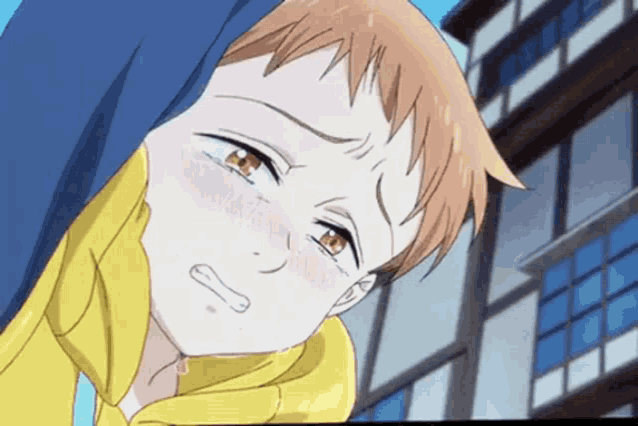 a close up of a cartoon character 's face with tears running down his face .
