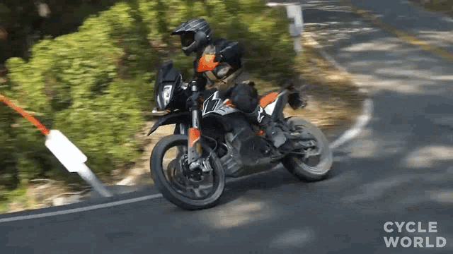 Taking The Curve With The Ktm790adventure R Cycle World GIF - Taking The Curve With The Ktm790adventure R Cycle World Taking A Sharp Right Driving On My Motorbike GIFs