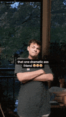 a man in a carhartt shirt is dancing with a caption that says " that one dramatic ass friend "