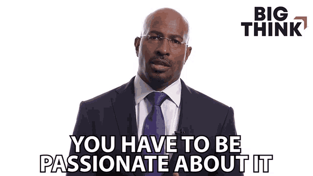 a man in a suit and tie is talking about being passionate about it