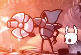 a cartoon character with horns is standing next to a cartoon character with a sword .