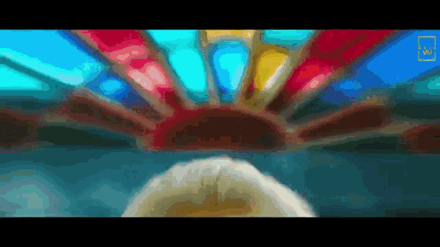 a pixel art of a stained glass window with a circle in the middle
