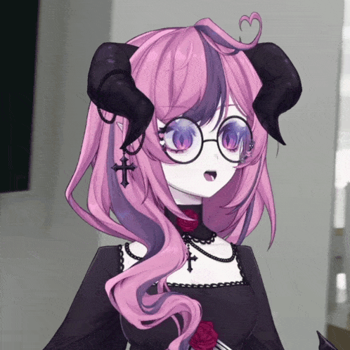 a girl with horns and glasses is wearing a black dress