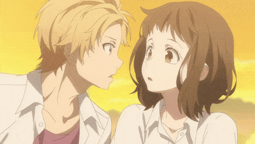 a boy and a girl are looking at each other with a yellow background