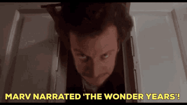 a close up of a man 's face with the words marv narrated the wonder years above him