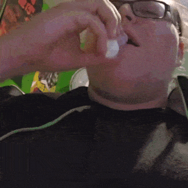 a person is holding a bottle that says ' i 'm ' on it