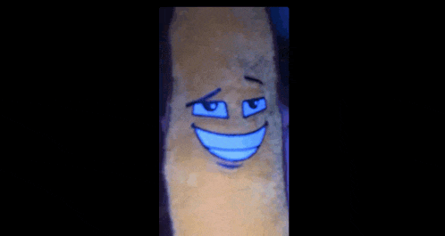 a close up of a cartoon character with a blue smile on its face
