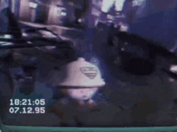 a video of a person laying on the ground with the time of 18:21 on the screen
