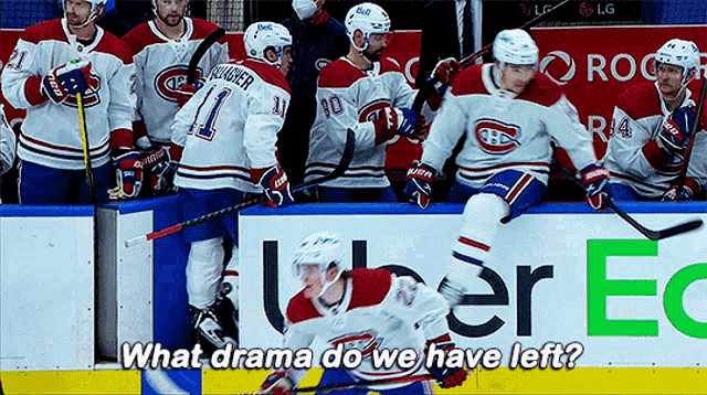 a group of hockey players are sitting on the ice and one of them says what drama do we have left