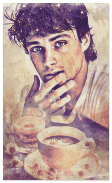 a man sitting at a table with a cup of coffee