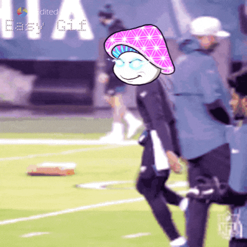 a cartoon of a mushroom on a football field with the words eesy gif visible