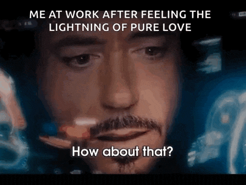 a close up of a man 's face with the words `` me at work after feeling the lightning of pure love how about that '' .