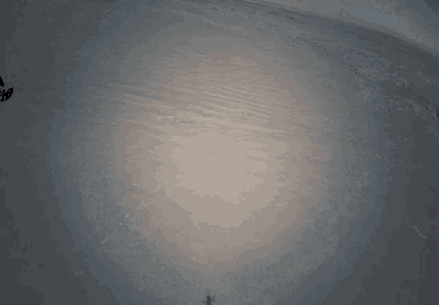 a gray colored surface with a few lines on it