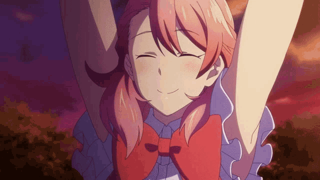 a girl with pink hair and a red bow is smiling