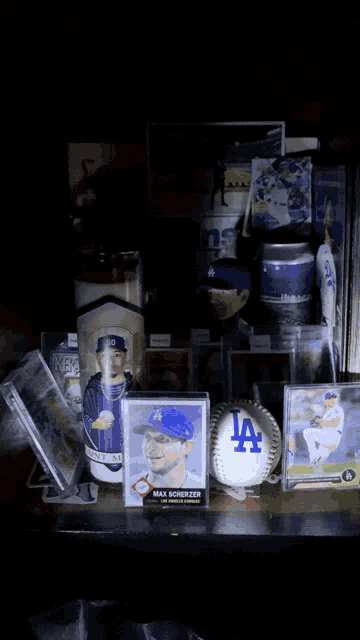 a collection of la dodgers memorabilia including a max schmerzer card