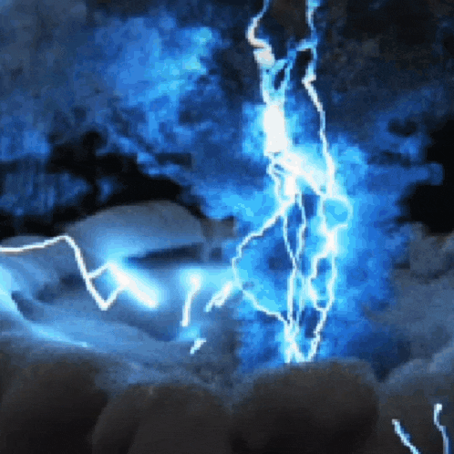 a blue lightning bolt strikes a rock in a cave