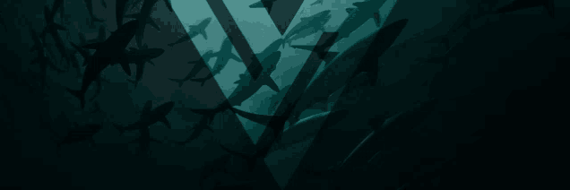a bunch of sharks are swimming in the dark near a letter v