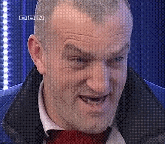 a close up of a man 's face with obn written in the corner