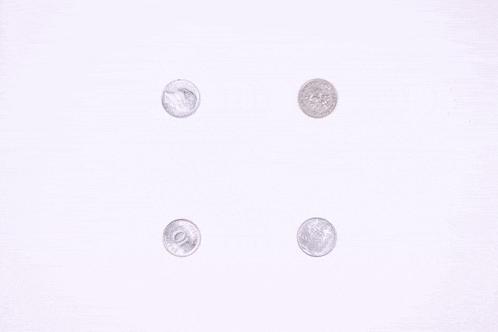 four silver coins are lined up in a circle on a white background