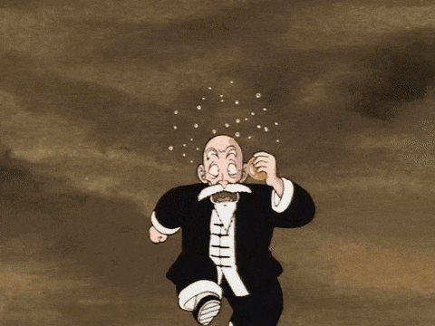 a cartoon character with a white mustache is running in the desert .