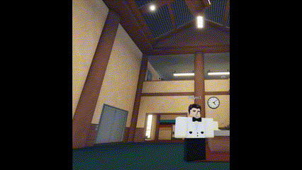a man in a tuxedo is standing in a room with a clock in the background .