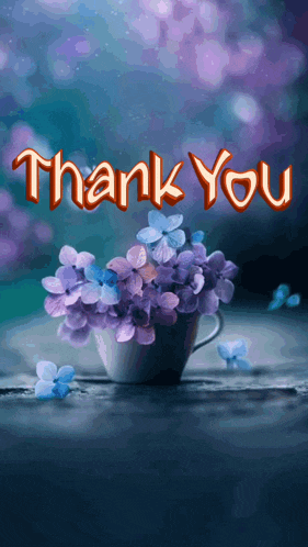 a thank you card with purple and blue flowers in a white cup