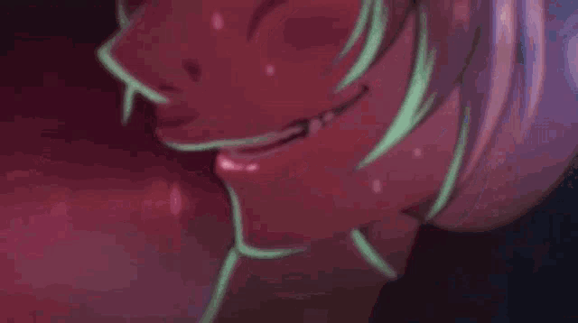 a close up of a person 's mouth with bubbles coming out of it