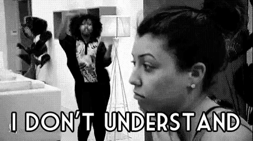 a woman is making a funny face in a black and white photo with the words `` i don t understand '' .