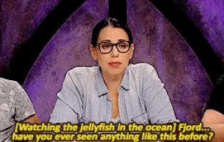 a woman wearing glasses is talking about watching the jellyfish in the ocean fjord have you ever seen anything like this before