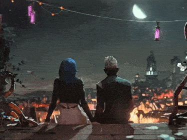 a man and a woman are sitting on a balcony looking at a city at night
