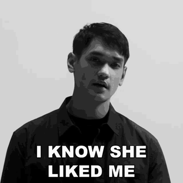 a black and white photo of a man with the words " i know she liked me "