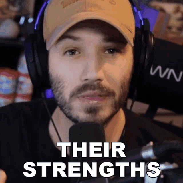 a man wearing headphones and a baseball cap says their strengths