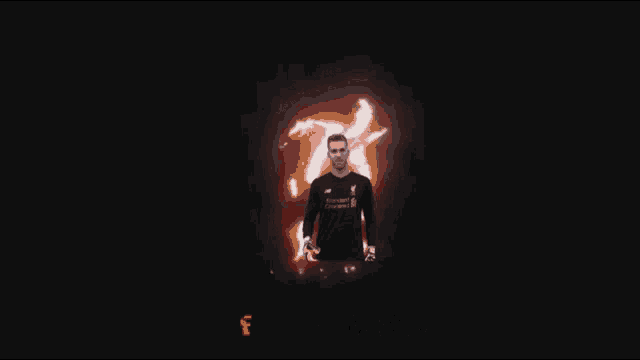 a man wearing a black jersey that says standard chartered