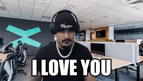 a man wearing headphones says " i love you "