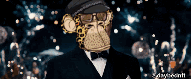 a man in a tuxedo with a monkey head on his face