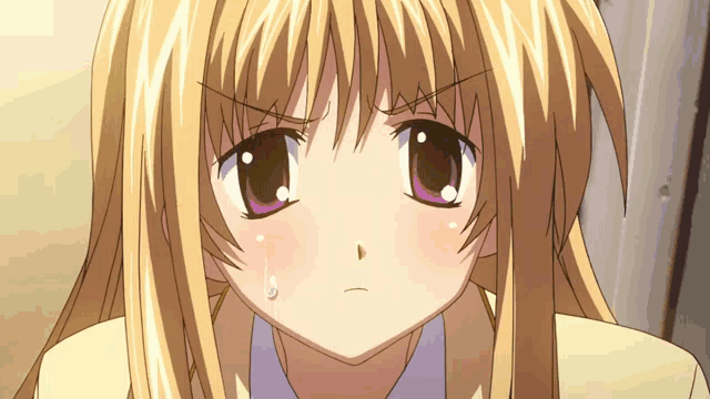a blonde anime girl with purple eyes and a tear running down her cheek