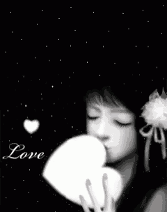 a girl blowing a heart in the air with the word love in the background