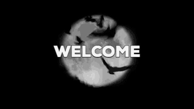 a black and white image of a full moon with the words welcome written in white